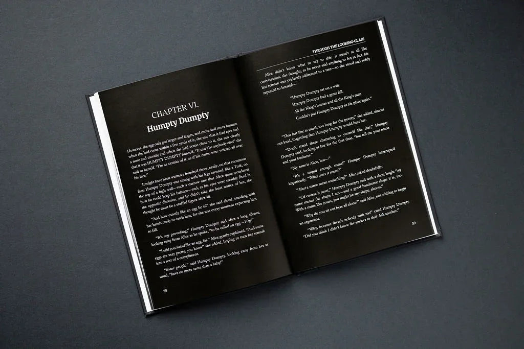 Open book showing text on a dark background