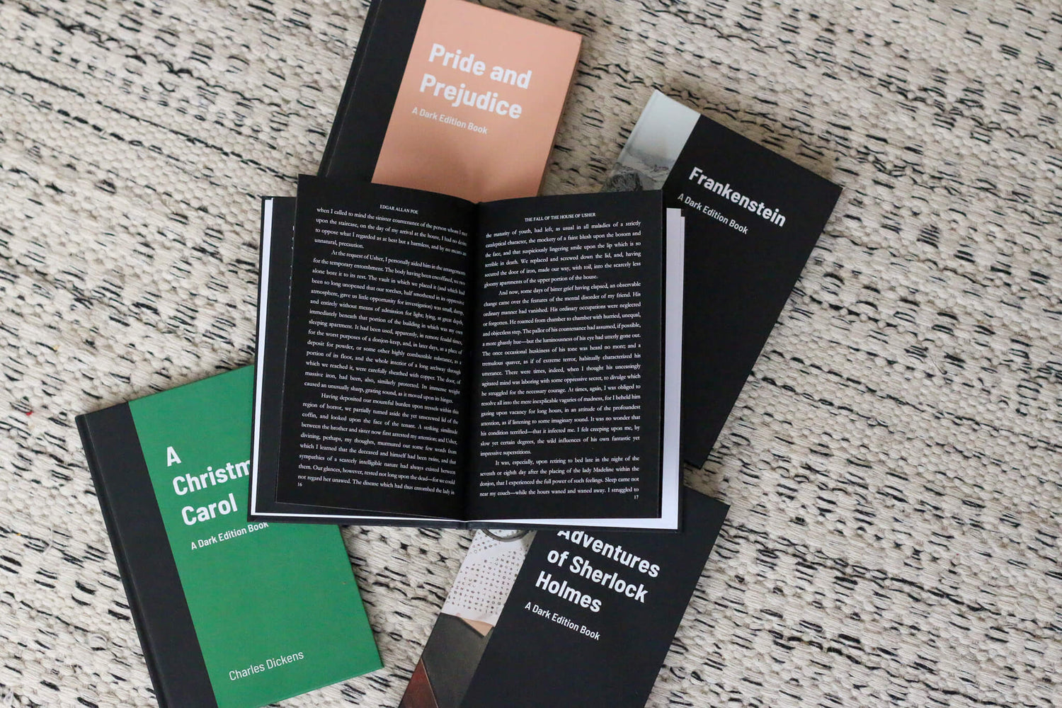 Collection of Dark Edition Books with black pages and white text