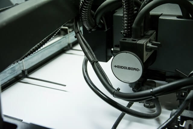Modern printer performing reverse printing on a white sheet of paper