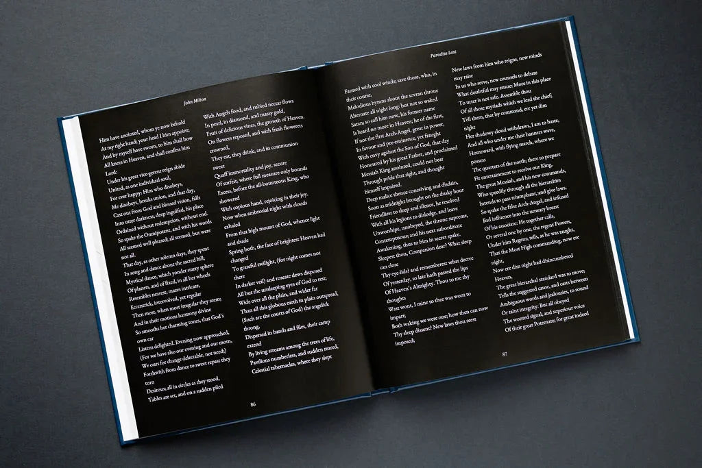 Open book with text on a dark gray background